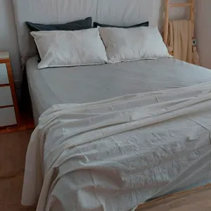 Pie de cama y almohadones